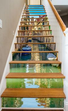 the stairs are painted with green and blue water