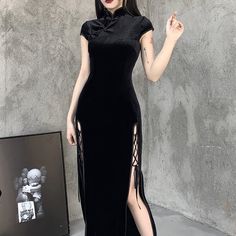 Introducing our Gothic Velvet Slit Cheongsam Dress, designed to turn heads and leave a lasting impression. This dress boasts an empire waistline and a mid-calf length, creating a sophisticated and elegant look. The dress features a unique lace-up crisscross design on both sides, adding a touch of edginess to the overall design. The thigh-high slit hem is perfect for showing off your legs and adding a touch of glamour to your look. Luxurious velvet fabric Empire waistline for a flattering silhoue Velvet Aesthetic, Short Pattern, Aesthetic Dress, 파티 드레스, Party Kleidung, Goth Dress, Cheongsam Dress, Vintage Material, Gothic Dress