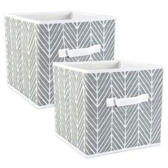 two grey and white storage bins with handles