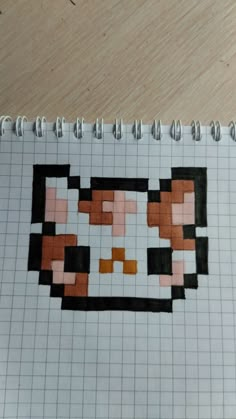 a piece of paper that has been made to look like an old school computer game character