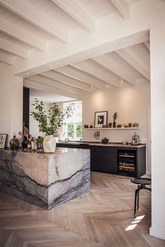 the kitchen is clean and ready to be used as a dining room or living room