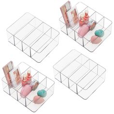 three clear storage containers with cosmetics and other items