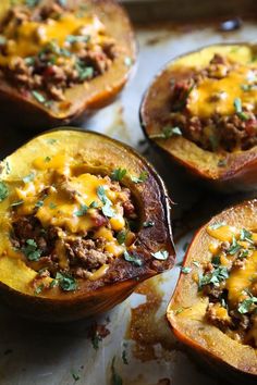 several stuffed sweet potatoes with meat and cheese