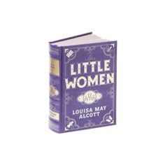 a purple book with the title little women written on it