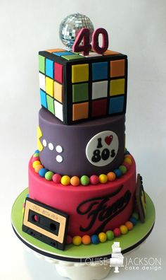 a cake made to look like a rubik cube with the number forty on it