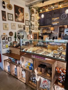 the inside of a bakery with many items on display