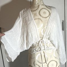 New With Tags On. Super Lightweight And Airy, Ties On The Front, Gorgeous Lace Around The Waist. Wide Kimono Style Sleeves That Are 2/3 In Length. Absolutely Stunning Piece, More Of A Style Statement Than A Coverup To Be Honest, Goes Really Well With Any Summer Outfit. Size M. Grey44 Summer V-neck Cotton Cardigan, Chic Long Sleeve Cover-up For Daywear, Spring Summer V-neck Cardigan, White Cotton Cover-up For Day Out, Chic Long Sleeve Loungewear Cover-up, Summer Long Sleeve One-size Shrug, Relaxed Fit Long Sleeve Cover-up For Day Out, White Wrap Cover-up For Spring, One Size Wrap Top For Beach