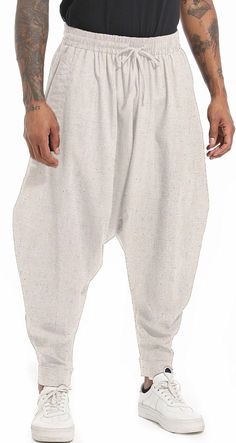 PRICES MAY VARY. Unique desgin,Casual Loose fit , high-quality cotton fabric offered by these Harem pants which delivers all-day comfort for you while looking stylish. This leisure hippie harem pants featuring with elastic waist with adjustable drawstring for maximum comfort, crotch design for ease of movement. These aladdin harem pants feature with 2 side pockets, The drop crotch design of these wide leg pants adds a trendy and relaxed look. The hippie aladdin harem pants perfects for your dail Affordable Khaki Cotton Harem Pants, Mens Harem Pants, Hippie Trousers, Coffee Dates, Pants Loose, Aladdin, Daily Life, Leg Pants, Pilates