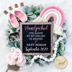 it's a girl and baby woman sign surrounded by flowers, shoes, and other items