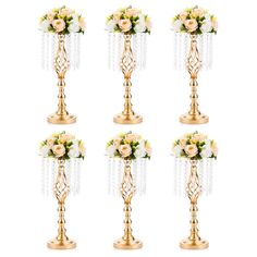 six gold vases with white flowers and chains hanging from the top, all in different positions