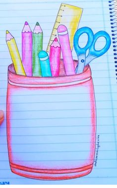 pencils and scissors are in a cup on lined paper