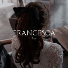 a woman sitting at a table with her back to the camera and text francesca free