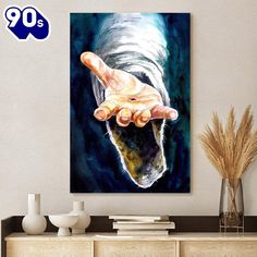 a painting of a hand reaching out for something