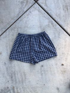 Blue Plaid Shorts. Great to wear for your next festival. Super cute summer shorts. Super cute and really comfy shorts. Made from cotton shirting with an elastic waist band. Great gift for a birthday, holiday or even a treat for yourself. All of my shorts are made to order so if you have a special request you can leave me a note with your order telling me your exact size specifications. If you don't see your size, if you need the shorts bigger or smaller just tell me and I can make it whatever si Casual Blue Boxer Briefs For Beach Season, Blue Short Boxer Briefs For Beach, Beachwear Bottoms With Built-in Shorts, Cotton Beachwear Bottoms With Built-in Shorts, Blue Short Boxer Briefs For Vacation, Casual Blue Boxer Briefs For Summer, Cotton Swim Trunks With Built-in Shorts, Casual Shorts For Beach Season Festivals, Summer Cotton Boxer Briefs For Loungewear