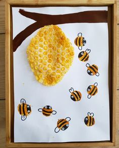 an art project made with honeycombs and bees