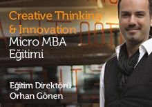 a man standing in front of a sign that says creative thinking & innovation micro mab egittim