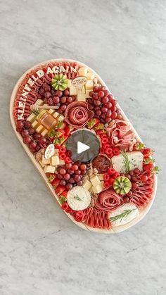 a platter with many different types of food on it