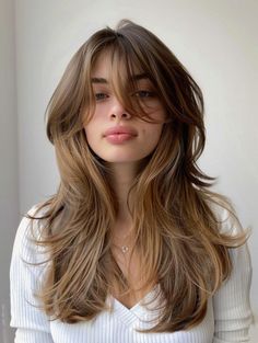 Long layers with curtain bangs are the most versatile hairstyle of 2024. This look can be easily customized to flatter any face shape and hair.#Face_Framing_Curtain_Bangs_Thick_Hair #Long_Length_Haircut_For_Round_Faces #Layer_Cut_With_Curtain_Bangs #Long_Layers_Haircut_With_Curtain_Bangs #curtain #bangs Long Bangs Textured Layers, Simple Curtain Bangs, Long Bangs With Layers, Whispy Curtains Bangs With Long Hair, Layered Hair Curtain Bangs, Curtain Bangs Layered Hair, Hairstyle With Color, Long Layers And Curtain Bangs, Long Layers With Curtain Bangs