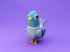 a blue bird standing on top of a purple surface with one eye open and the other hand up in the air