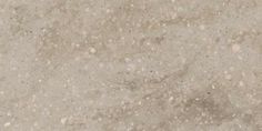 a close up view of the surface of a marble slab with white speckles