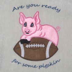 a pink pig sitting on top of a football ball with the words are you ready for some pigskin?