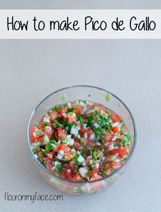 a small glass bowl filled with salsa and garnished with chopped cilantro