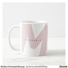 a coffee mug with the name michaela on it