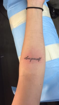 a woman's arm with a tattoo that says, you are yourself on it