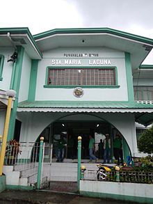 the front entrance to sta maria laguna with people walking in and out