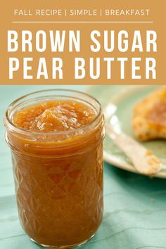 a glass jar filled with brown sugar and peanut butter on top of a green table cloth