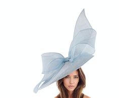 Baby Blue Statement Hatinator Kentucky Derby Fascinator Womens Ascot Headwear Ladies Day Hats Formal Occasion Feather Headpiece Tea Party Hats By Cressida Kentucky Derby Ascot Fascinator Hats Baby Blue Barn Owl Fascinator Hat Gorgeous extra large baby blue sinamay flat saucer hatinator trimmed with a baby blue modern take on a bow This baby blue fascinator measures 48cm wide or about 19 inches This pale blue headpiece is mounted with a matching headband.   If you prefer a headband to match your Elegant Blue Hat For Spring, Chic Blue Hat For Spring, Chic Fitted Blue Hat, Chic Blue Fitted Hat, Blue Hats For Church In Spring, Chic Blue Fascinator For Kentucky Derby, Blue Fascinator With Short Brim For Summer, Blue Short Brim Fascinator For Summer, Blue Curved Brim Mini Hat For Races