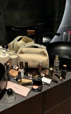 a counter with cosmetics and other items on it