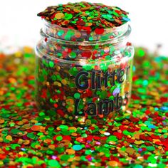 a jar filled with lots of colorful confetti