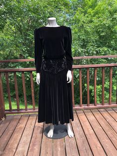 Vintage 80s Lori Ann drop waist dress. Lovely fitted waist section with a fuller skirt. Has long sleeves and shoulder pads. In great condition but in some light the velvet looks red (not super noticeable). The smallest section in the waist so please make sure the waist will fit you nicely.  Fits S 26-28" waist (28 will be snug) 36" hips (right where the fitted waist section ends) 37" bust Up to 18" shoulder - shoulder 21" sleeve 49" length Dress Velvet, Drop Waist Dress, 80s Style, Dress Fitted, 80s Dress, Dropwaist Dress, 80s Fashion, Waist Dress, Drop Waist