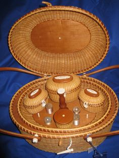 two wicker baskets sitting on top of each other