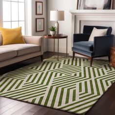 a living room with two couches and a rug on the floor in front of a fireplace