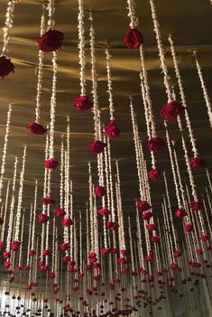 red and white decorations hanging from the ceiling