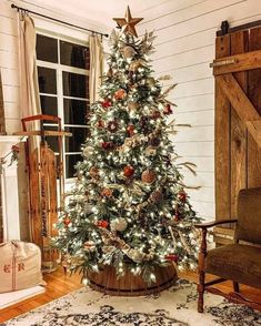 a decorated christmas tree in a living room