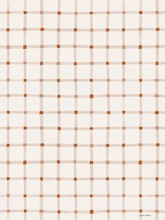 an orange and white checkered pattern on fabric