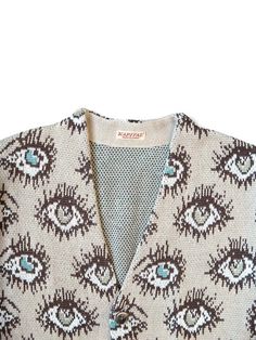 This cardigan features a speakeasy pattern knitted with jacquard for a unique design. the mid-gauge knit provides a moderate thickness while the shorter length and loose silhouette offer a comfortable fit. Short Cardigan, Sea Ny, Beige Cardigan, Simon Miller, A Perfect Circle, Jacquard Knit, Satin Skirt, Engineered Garments, Patterned Shorts