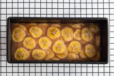 some bananas are sitting in a pan on the counter