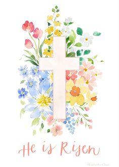 a cross with flowers and the words he is risen