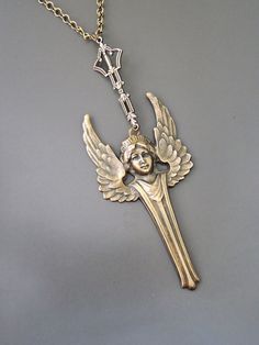 "Vintage Jewelry - Art Deco Necklace - Vintage Necklace - Angel Necklace - Brass Jewelry - Statement Necklace - Chloe's Vintage jewelry This is such a beautiful necklace! A large vintage brass Art Deco Angel hangs from a pretty vintage brass ladder chain. So very bold and feminine. Chloe says, \"Wear it and feel fabulous!\" This pendant is 3 3/4\" long. You can choose the necklace length you would like at checkout. Thanks for visiting Chloe's" Art Nouveau Necklaces, Goddess Necklace, Vintage Jewelry Art, Brass Art, Angel Necklace, Art Deco Necklace, Jewelry Statement, Message Jewelry, Brass Necklace