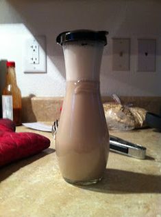 a bottle of milk sitting on top of a counter