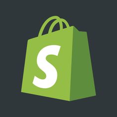 a green shopping bag with the letter s on it's front and bottom half