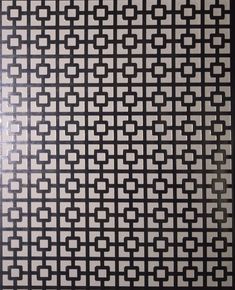 a black and white pattern is shown on the wall