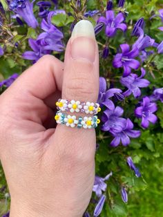 Floral Rings 🌷  ♡ Free delivery to the UK 🇬🇧 2-4 days Standard International Delivery 5-12 days * estimated delivery dates * 🌷  Please see last photo for size guides 🥰  NOTE: these are not made with elastic. These are made with beading thread.  ♡ ♡ ♡ ♡ ♡ ♡ ♡ ♡ ♡ ♡ ♡ Message: if the items you order are ever there wrong size, please message me and we can amend this free of charge 😊 thank you. Flower Rings, Beading Thread, Schmuck Diy, Flower Ring, 12 Days, Stackable Rings, Floral Rings, Beauty Book, Jewelry Rings