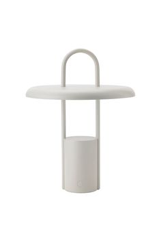 a white table with a light on top