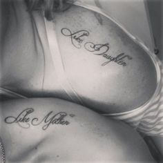 two women with tattoos on their stomachs, one has the words like mother and daughter