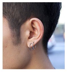 a man with ear piercings on his ears